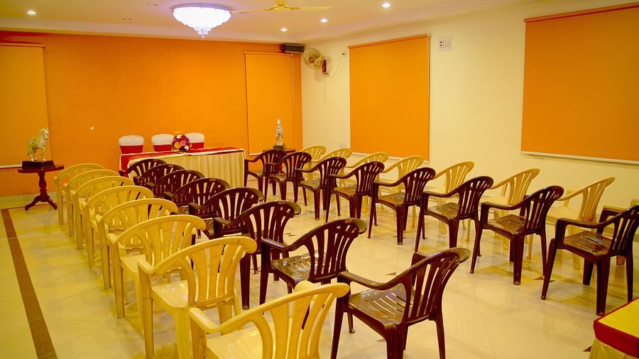  Hall Hotel Yasodha Towers - Interior view of the conference room featuring 4 columns of chairs placed on either sides of the room