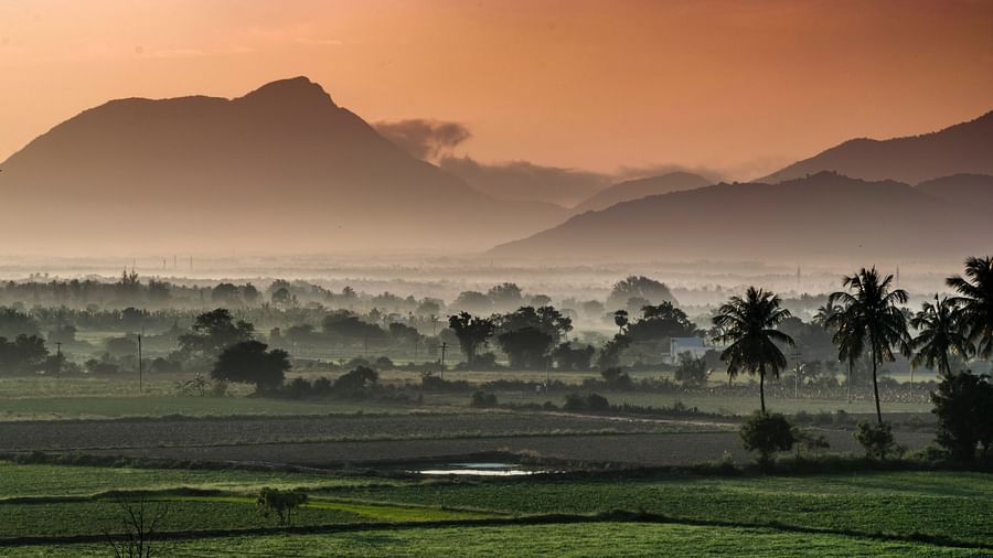Overview of the nature setting in Coimbatore with rolling hills and mountains in the background