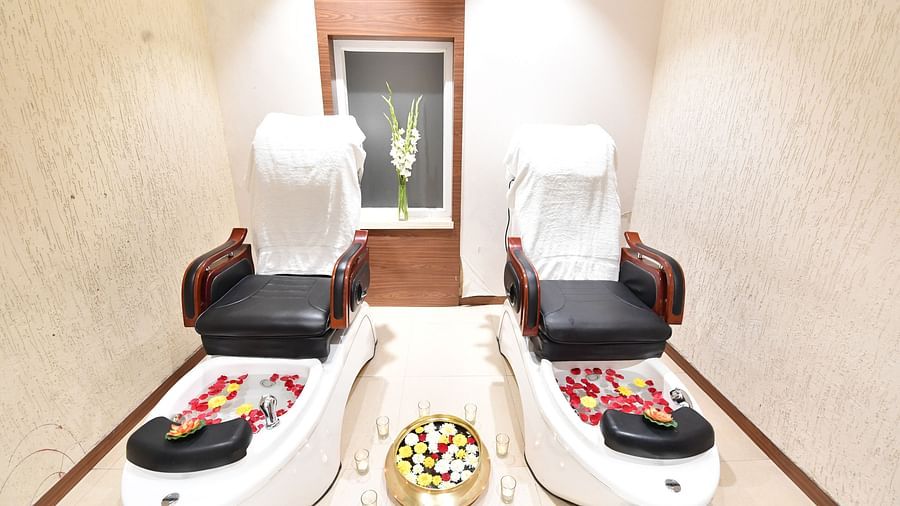 overview of the Pedicure Station with two chairs for customers to sit in - IOSIS Spa & Wellness