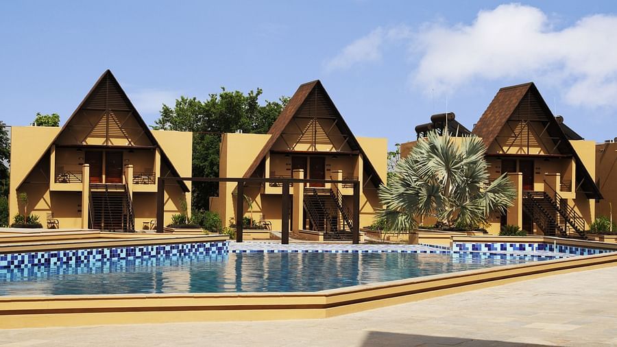 view of cottages and pool at Jagira Ananta Elite
