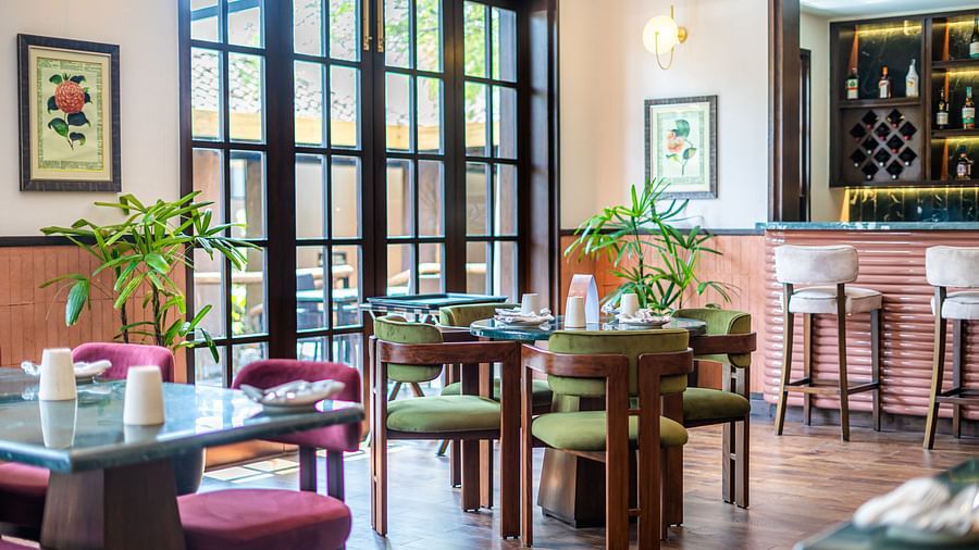 Elegant restaurant interior with seating at Jehan Numa Retreat