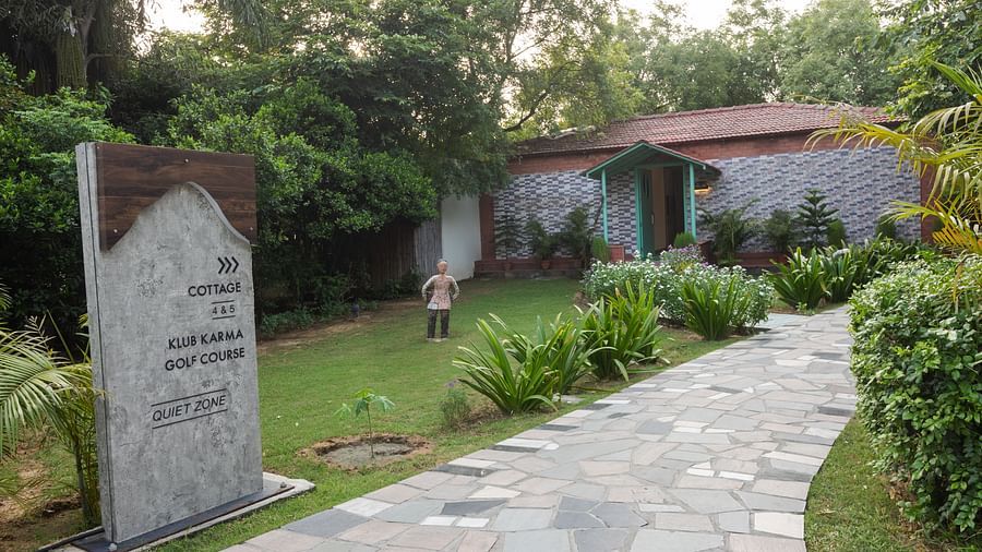A pathway leading to Garden Suite with a garden in view - Karma Lakelands.