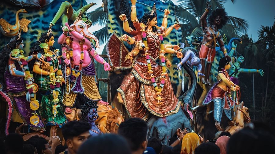 an image of devi durga and her children the time of Immersion