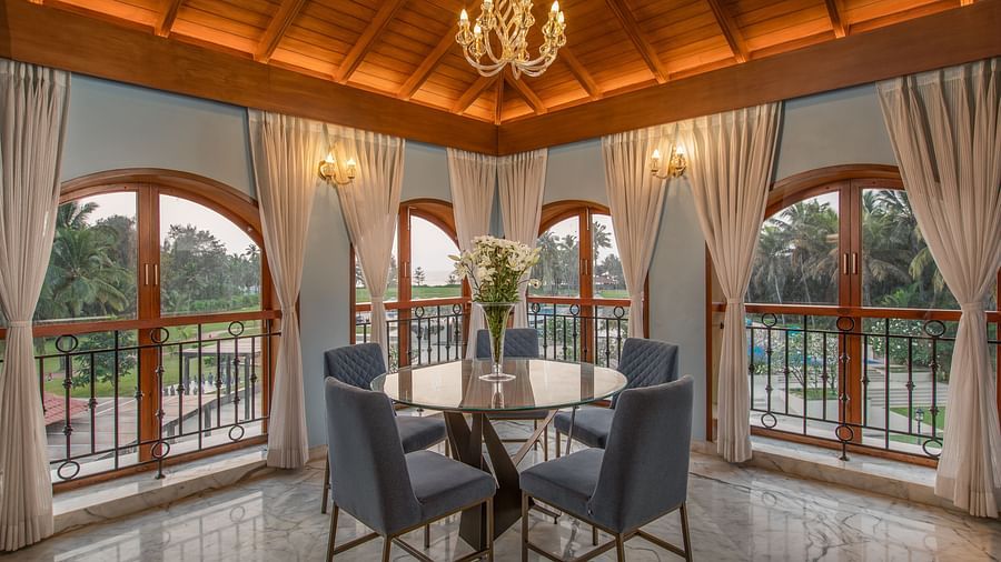 elegant Presidential Suite Dining Area with soft lighting from atop