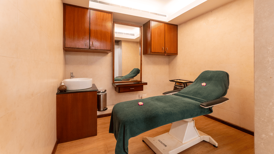 Private spa treatment room featuring an adjustable therapy chair at Kenilworth Resort & Spa, Goa.