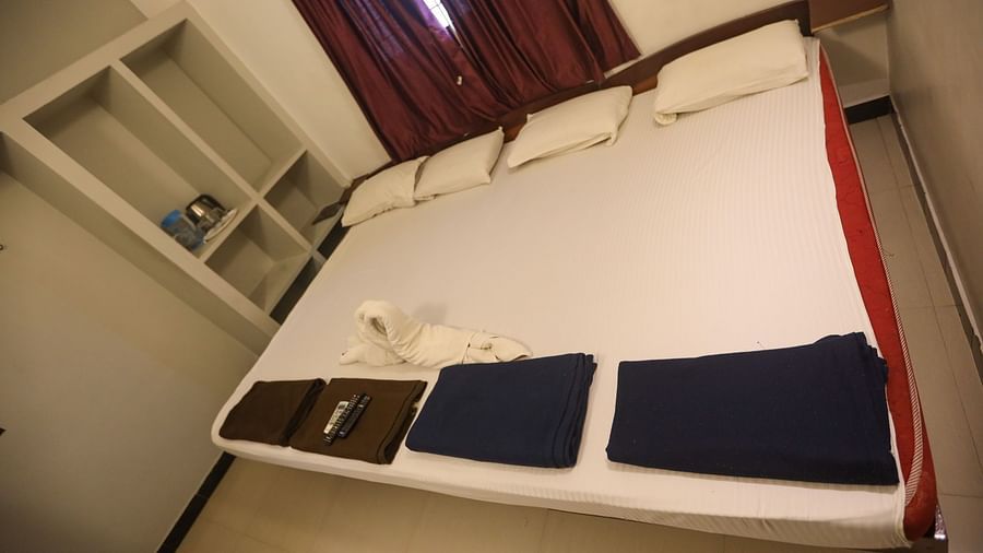 a family room with plushy bed, and the cupboard at La Paradise,  Residency 