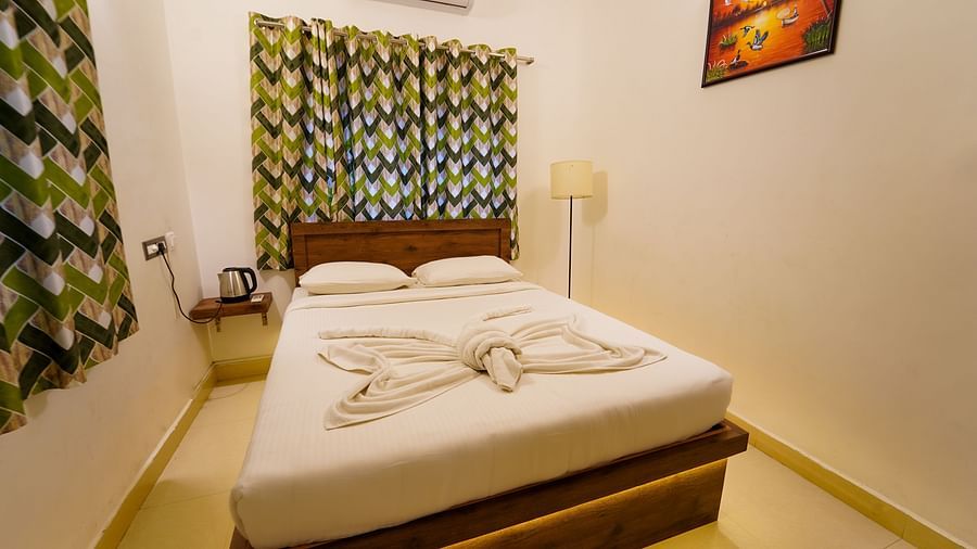 Side view at   A double bed at Three Bedroom Villa bedroom at Le Poshe Luxury