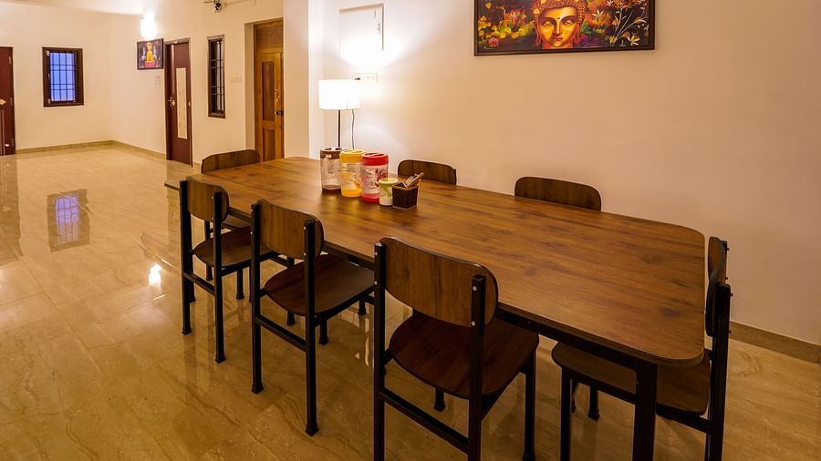 Dining area with a table for 8 set up inside Superior Villa - La Tamara Luxury, Pondicherry