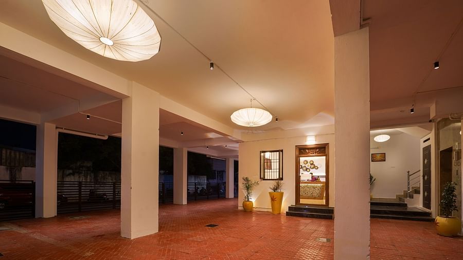 Parking area with pillars and chandeliers on the roof - La Tamara Luxury, Pondicherry