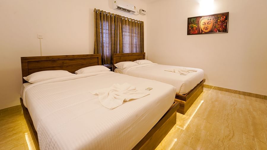 Two double beds inside one of the rooms of Superior Villa - La Tamara Luxury, Pondicherry