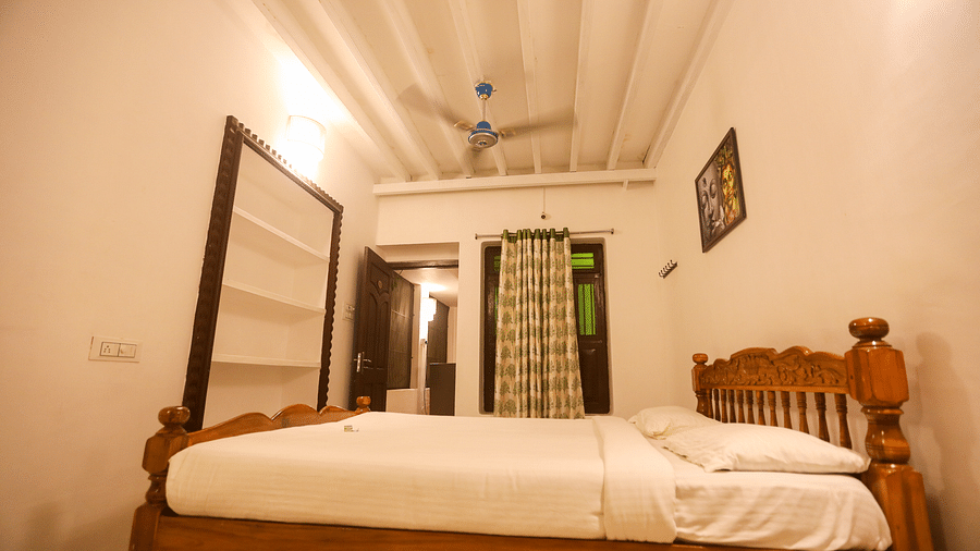  Aside view of the bedroom at la villas Heritage, pondicherry