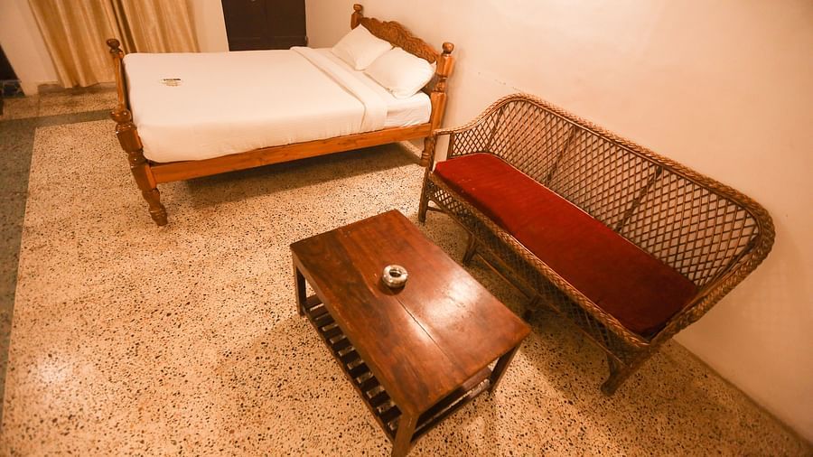 A close view of the with comfy bed and sitting area at la villas Heritage, pondicherry