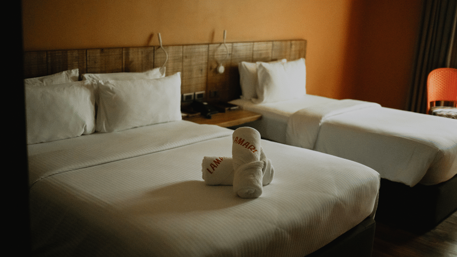 Twin bed accommodation at Lamari Siargao