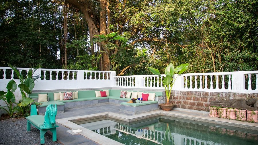 view of the l shaped pool from a distance