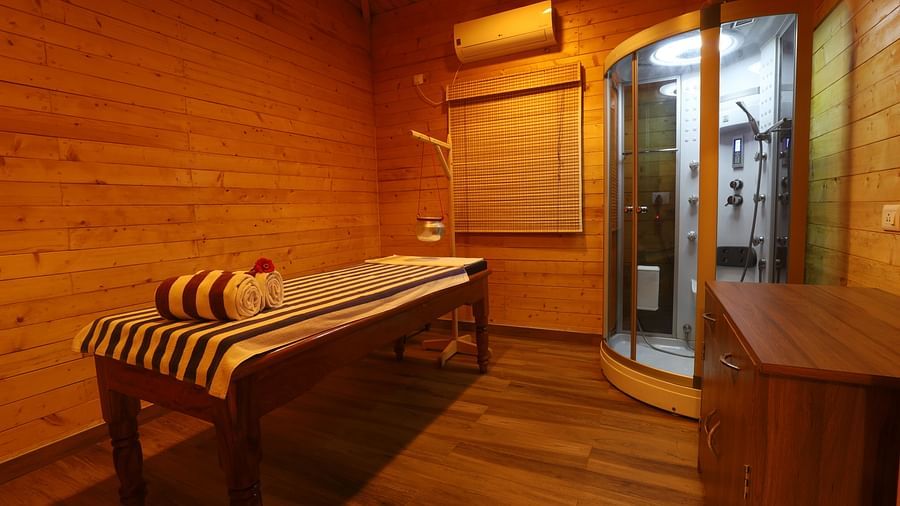 A massage room with single bed- Lotus Eco Resort Konark