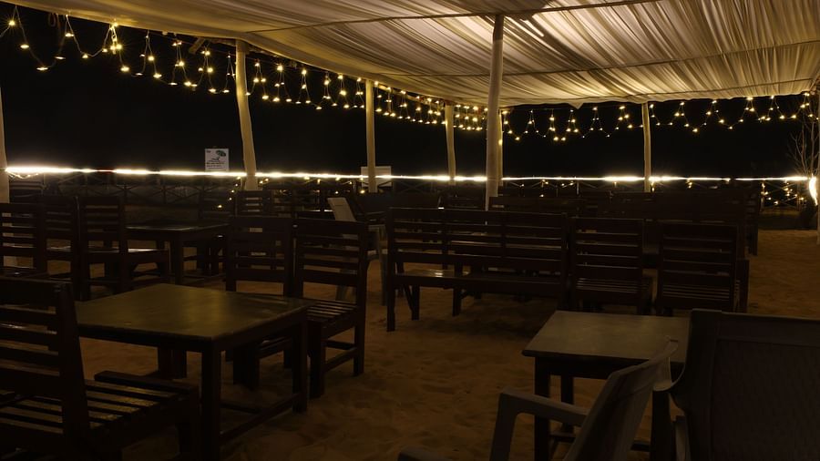 Wooden furnished dining are in forest villa at Lotus Eco Beach Resort Konark 