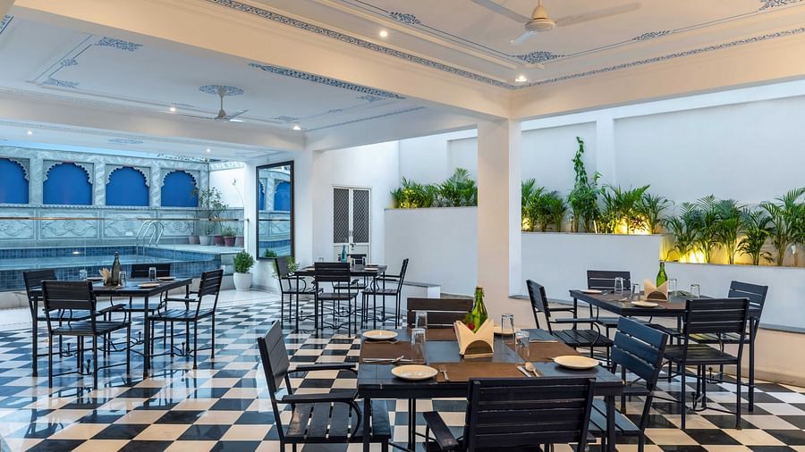Seating arrangements inside the in-house cafe - Maan Vilas by Stone Wood, Udaipur