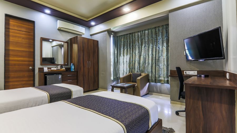 Twin bedroom facing window