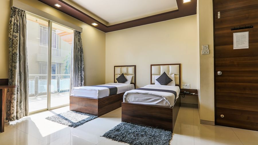 twin bedroom with open window