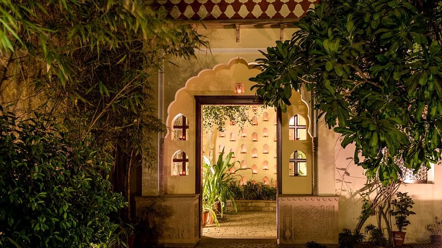 An entrance to a door with Rajasthani design on it - Mandawa Haveli, Jaipur