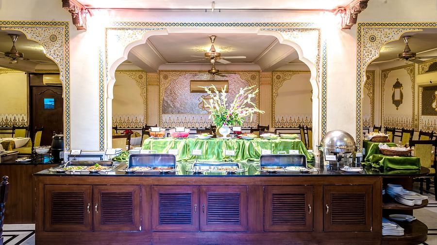 Buffet counter next to seating arrangements at Hari Mahal - Mandawa Haveli, Jaipur