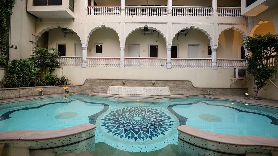 Front view of the swimming pool with the steps leading to it - Mandawa Haveli, Jaipur