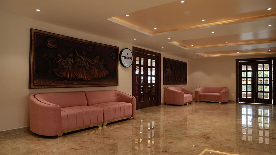 An image of a seating area in a lobby at Mastiff Grand, Dharwad