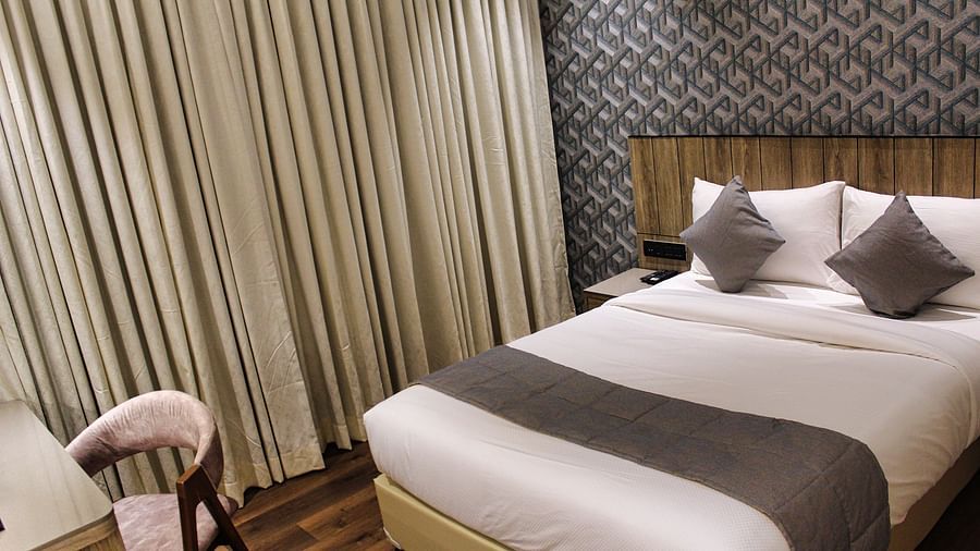 Deluxe King room with comfortable bed at Maxxvalue Hotel MIDC,  Mumbai