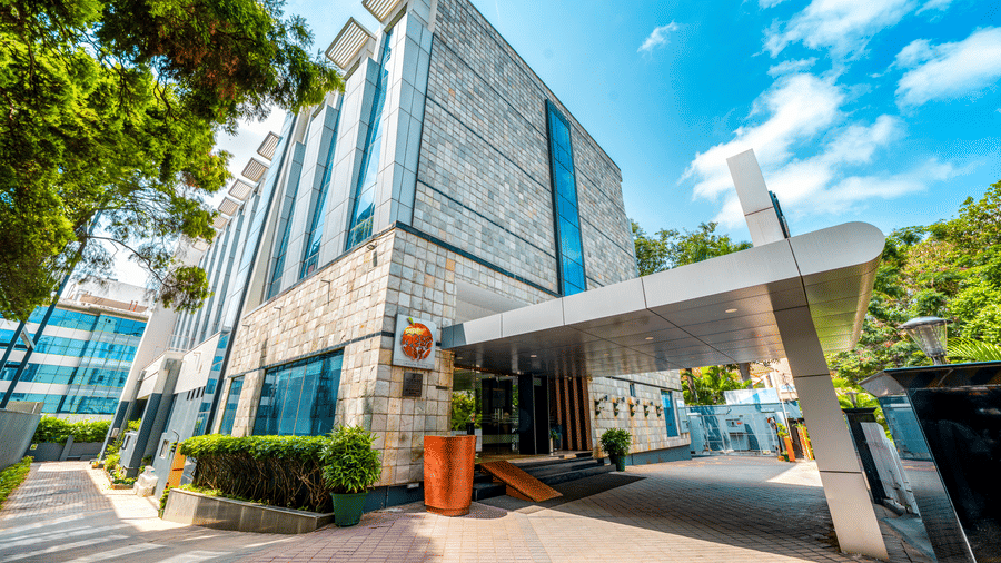 The building with mutliple windows and an entrance. | MGM Mark Whitefield