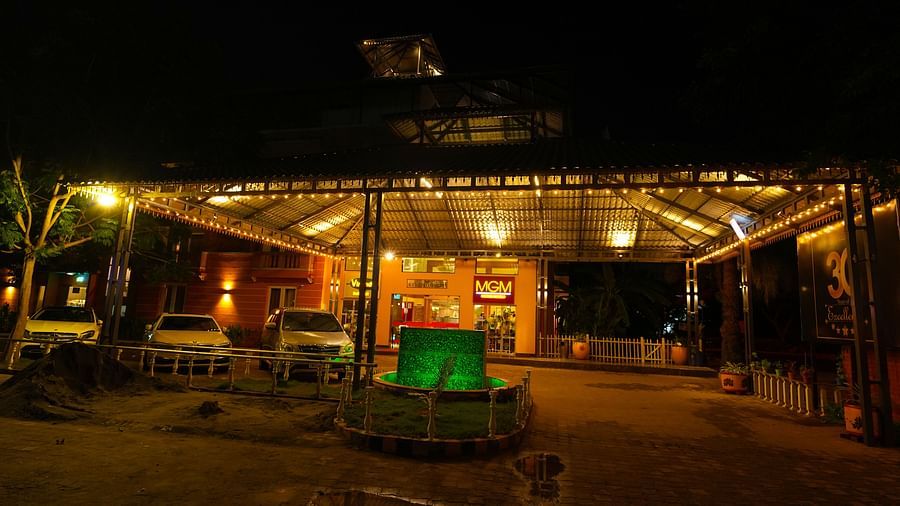 Facade of MGM Vailankanni Residency featuring the parking space during night time