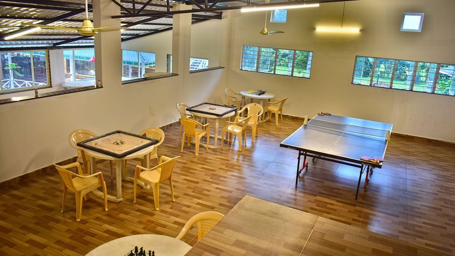 Picture featuring a room with the indoor games