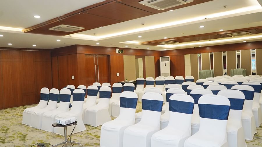 Conference room at Nemesia set up in theater style with rows of chairs facing the front.