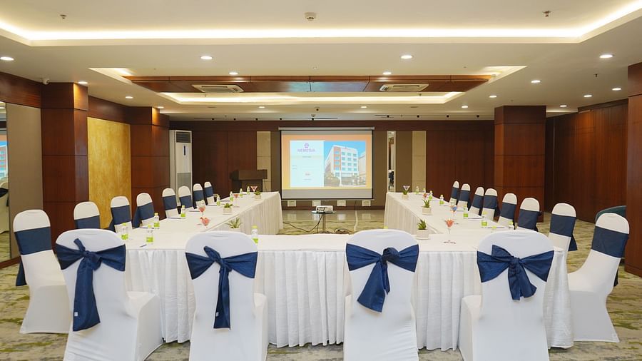 U-shaped seating arrangement in a conference room at Nemesia, ideal for group discussions and meetings.