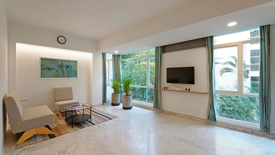 Corner sofa seating in Studio Premium Room at Nest by Rivido Apart Hotel, Bannerghatta Road