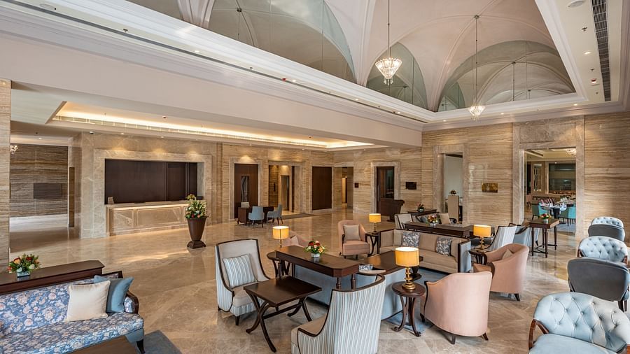 chairs and tables in the lobby area of Park Plaza, Jalandhar