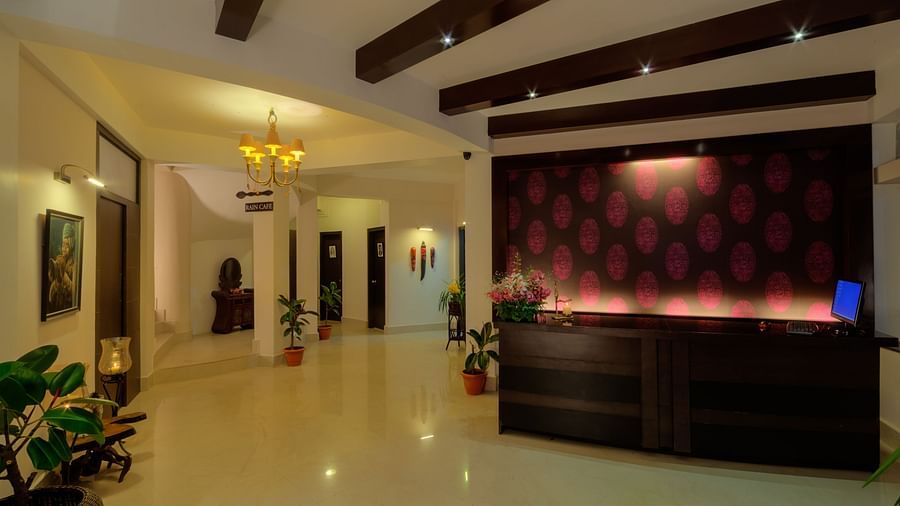 the lobby area and the front desk at orchid resort in cherrapunji