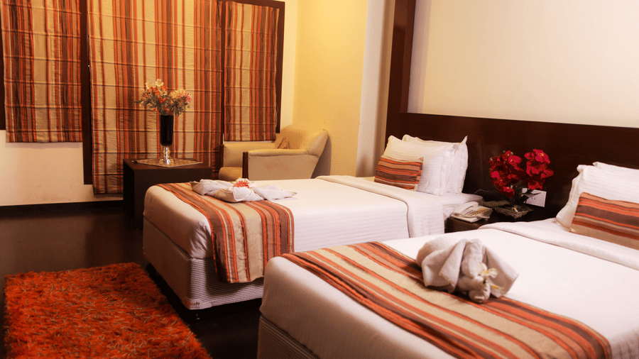 twin beds offered at one of the rooms - Polo Towers, Shillong