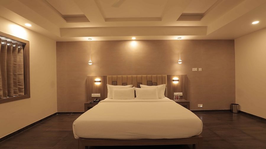 bedroom at Pride Biznotel, Sasan Gir