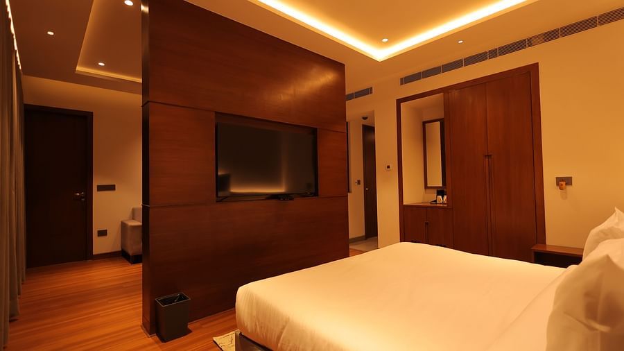 view of the king size bed of Suite at Pride Elite, Haridwar