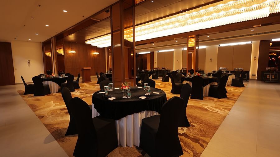 view of the banquet hall with chairs and tables at Pride Elite, Haridwar