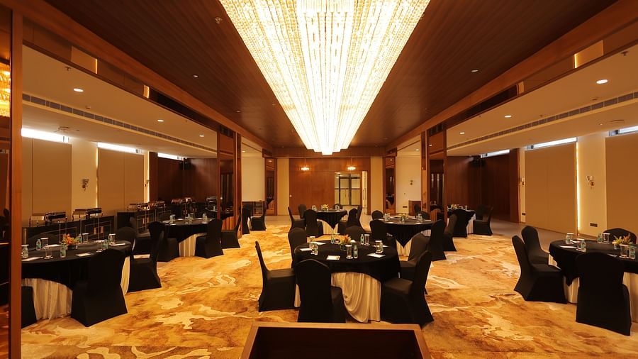 view of the banquet hall with chairs and tables at Pride Elite, Haridwar