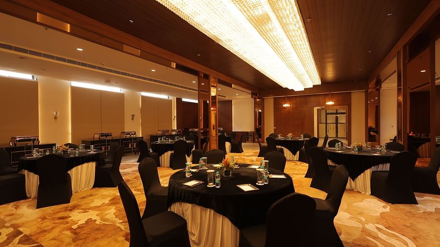 view of the banquet hall with chairs and tables at Pride Elite, Haridwar