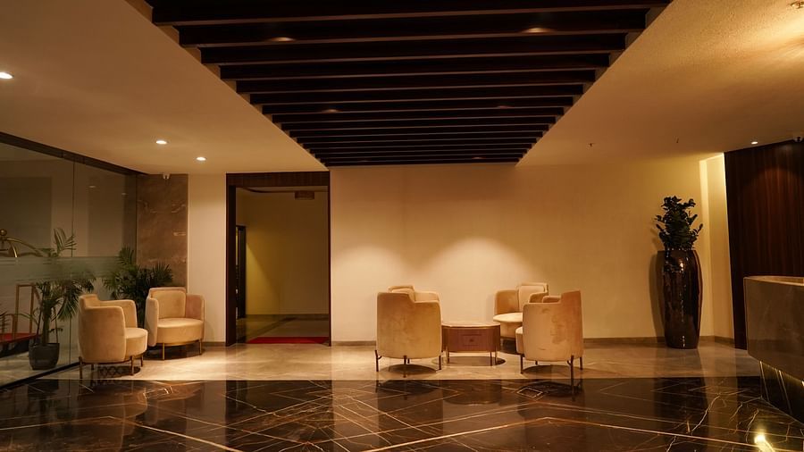 Pride Ranakpur Resort Convention Centre - interior view of the reception area featuring a geometric pattern flooring with multiple seating options