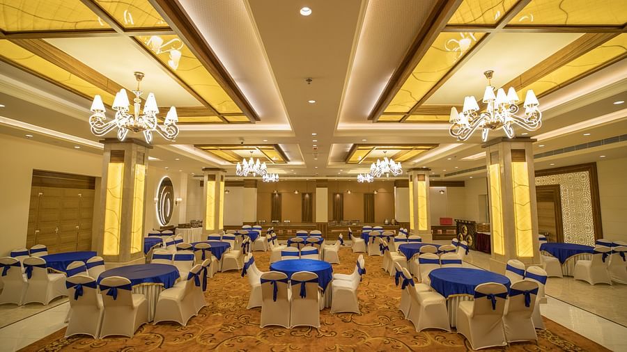 interior of Royal Velvet arrayed with elegant seating arrangements at Ramada by Wyndham Kapurthala