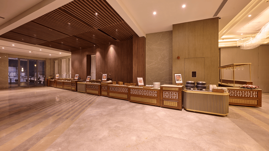 Hotel lobby at Riviera Sarovar Portico, Pathankot featuring spacious interiors, modern design and welcoming seating areas.