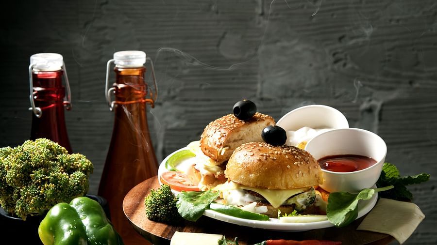 burgers and dips on a plate