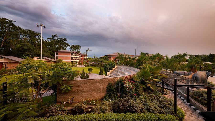 An aerial shot of a hotel in Chitwan featuring landscaped gardens, seen during an evening sky - Royal Tulip, Chitwan