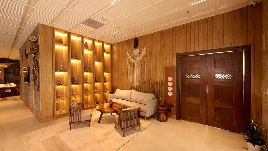 Interior of the hotel with a chic lounge area, elegant decor, and soft lighting - Royal Tulip, Chitwan