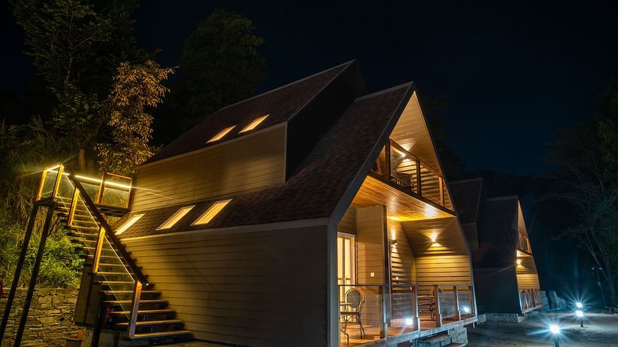a close up shot of a room with stairs leading to the first floor - Samsara Luxury Cottages & Spa