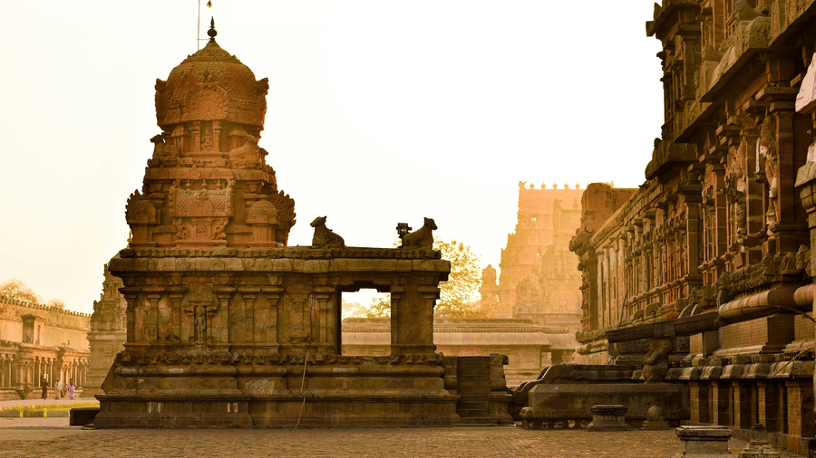An overview of a temple in Thanjavur made of stone with sepia filter. It is one of the Places of Interest in Tanjore.